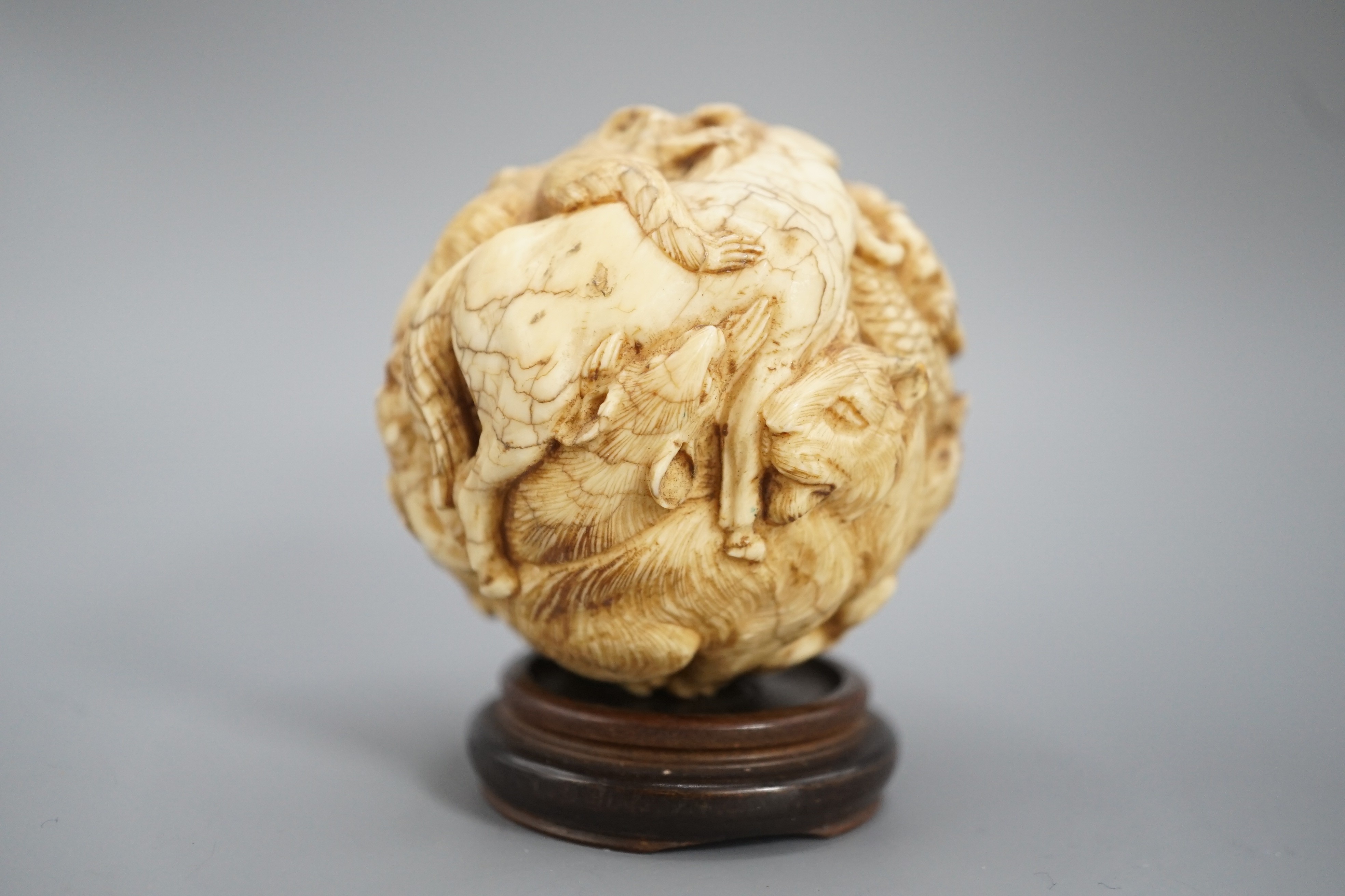 A Japanese ivory ‘Zodiac animal’ ball, early 20th century, 5cm